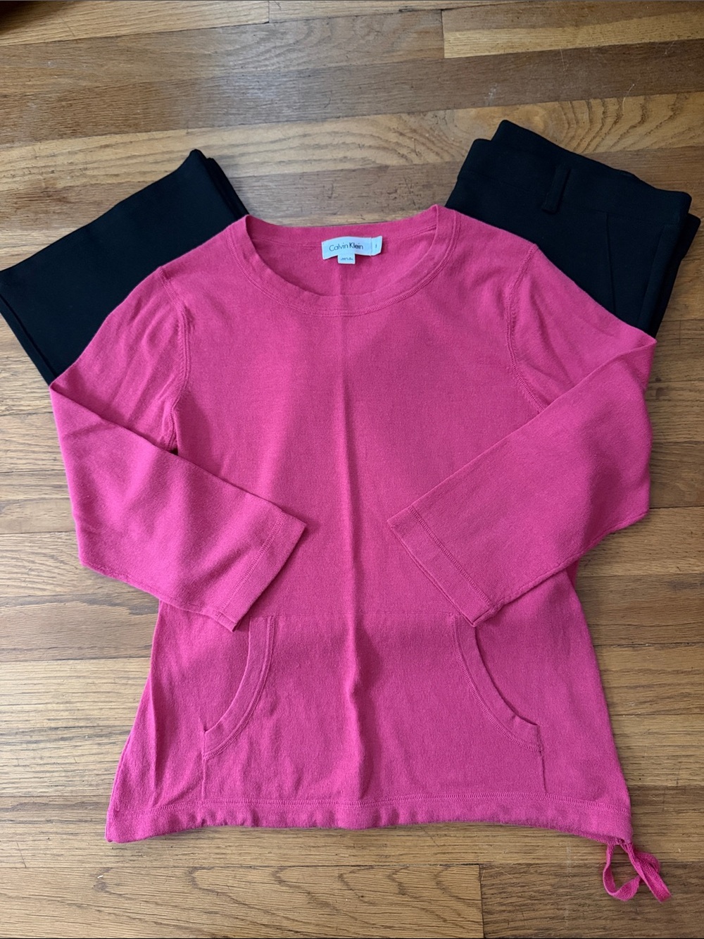 Calvin Klein pink sweater with pouch pocket and drawstring hem. Size S.